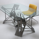 Illustration for article titled Futuristic Origami Desk Cut and Folded from a Single Sheet of Steel